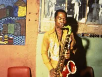 Fela playing the Saxophone