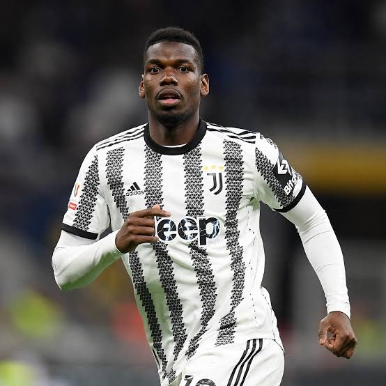 A picture of Juventus midfielder Paul Pogba running 