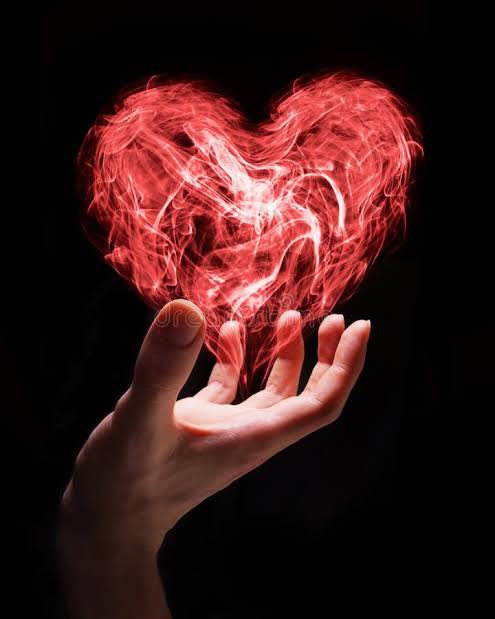 Relationships are a fundamental: A picture of a hand holding a flamed heart 