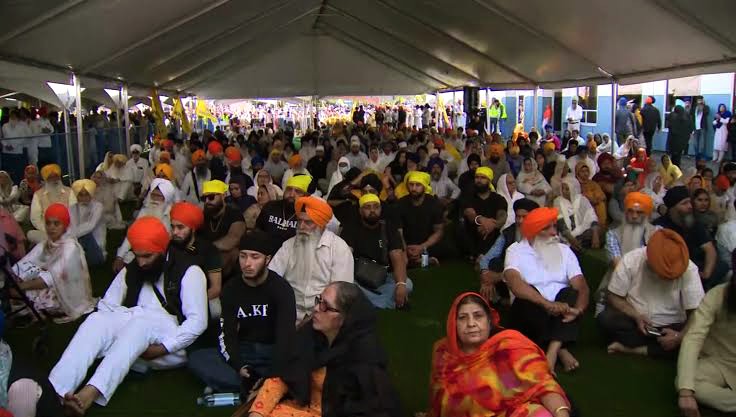 A picture of members of the Sikh Community