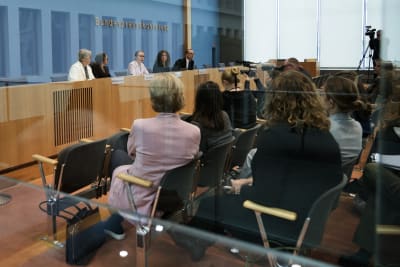 A picture of advocates sitted in a hall having a debate over the proposed abortion law