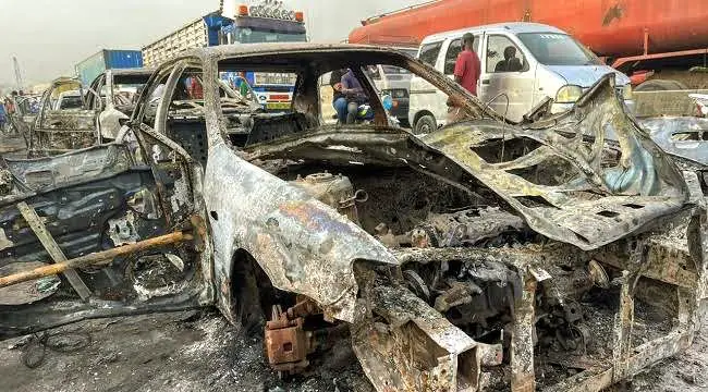 A picture of a burnt vehicle at the East-West Road, Rivers State